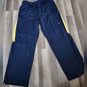 Nike Active Pants Size Large. Nike Logo Zipped Blue & Yellow